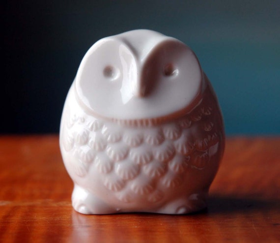 white ceramic owl figurine