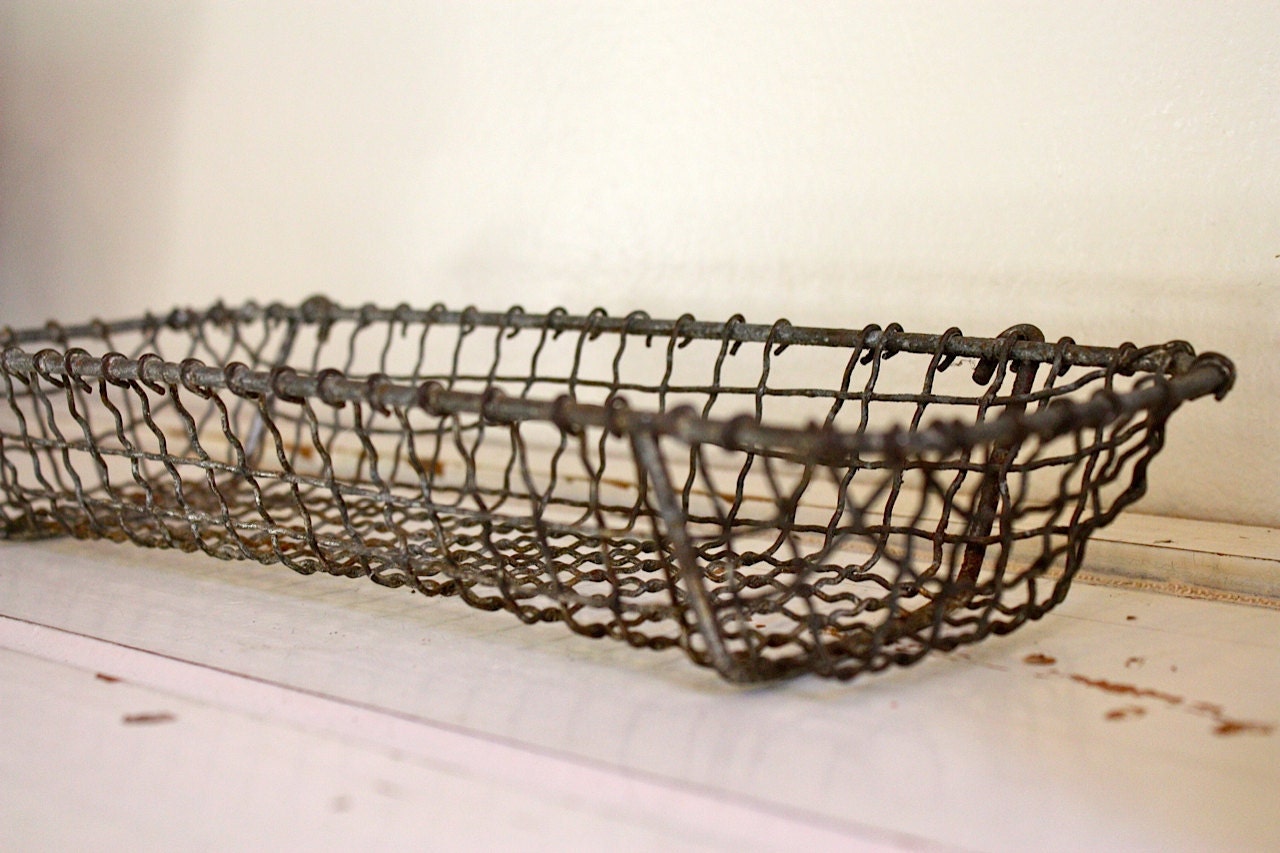 Interesting long narrow vintage wire basket