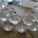 Silver Grey Topaz faceted onion briolettes - 7-8mm, 1/4 strand