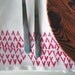 block print cloth napkins. little v's and teepees. set of four.