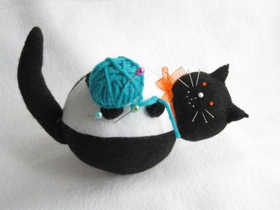 black and white cat cushion