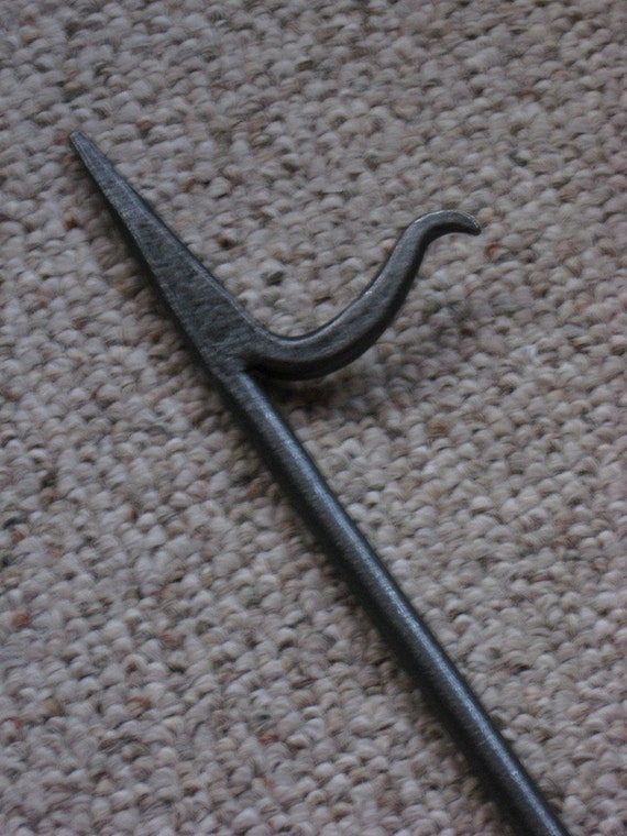 hand fireplace poker