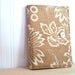 list taker in brown and cream 2