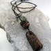 Urban Primitive Gemstone Cairn Pendant - Fossilized Bone, Steel, Bronze and Green Amethyst Pendant