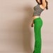 Bright green baby corduroy pants- chic, bold, flared, sit perfectly on the body, size 4 only