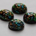 Vintage Black Glass Cabochons with Rainbow Foil Inclusions 18mm x 13mm cab508
