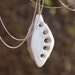 Plankton no.2 - porcelain and silver necklace. Designed by Wapa Studio.