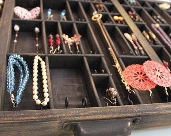 Jewelry Display repurposed from vintage typeset tray