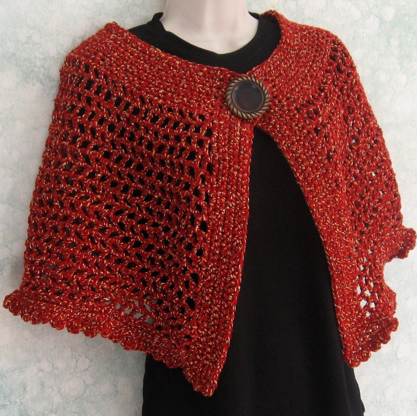 Womens Crochet Cape Pattern With Large Button Trim And Snap