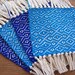 handwoven coaster set in sky blue and true blue, set of four