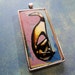 TinyArtJewelry's Long on Elegance greyhound pendant 1" x 3" silvertone