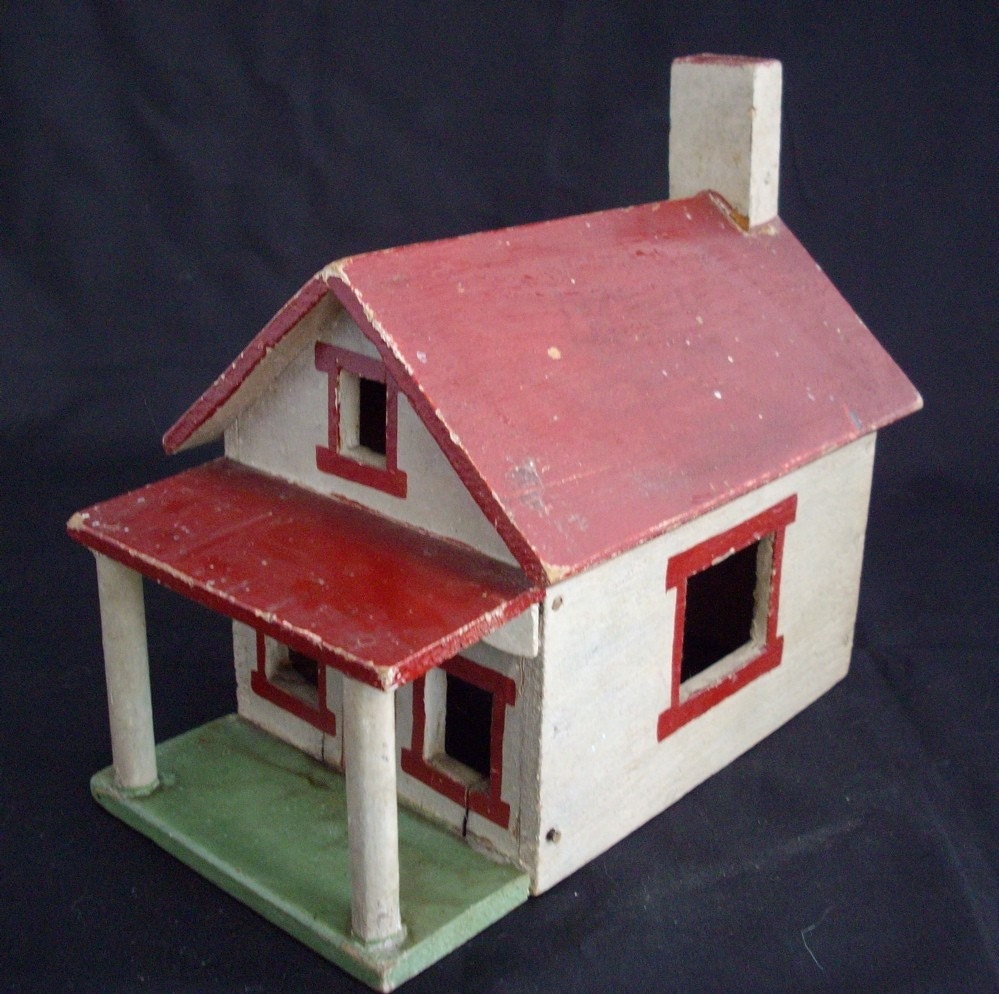 Vintage wooden folk art house white with red roof