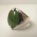 JADE SIGNET RING. High grade Deep Green Jade cabochon set in sterling silver. Size 9 1/4