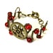 Steampunk Jewelry - Bracelet - Brass Gear and Red Glass