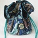 The perfect travel organizer Jewelry Pouch in anti tarnish blue Jacobean flowers