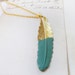 Hand Dipped Brass Feather Necklace In Teal