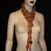 Autumn HuesThin Long Hand Knit Lariat Textured Softness Scarf Neck Warmer Big Wooden Bead Weights Add Charm Splendor
