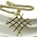 Big Pendant Necklace. Long Necklace. Metal Charm Necklace. 24 inches. Geometry. Crossing Lines. Antiqued Brass. Zig Zag.