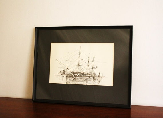 black and white sailboat framed