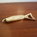 Vintage brass fish bottle opener