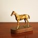 Vintage 1930's gold cast metal horse