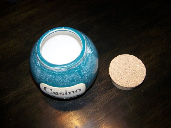 Casino money pottery jar