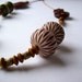 Eclectic necklace.Vintage lucite urchins. Vintage buttons.Coconut shell,bone and lucite rondelles.
