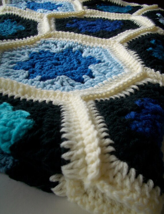 Modern granny square blanket in black and blue crochet afghan