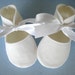 White Cotton Baby Booties with White Satin Ribbon Ties
