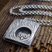 Whimsical owl in a tree necklace