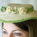 Vintage Tilt Hat Beige with Ivory Flowers and Green Velvet Ribbon