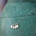 FOUR Charms Tiny Initial Necklace in Sterling Silver