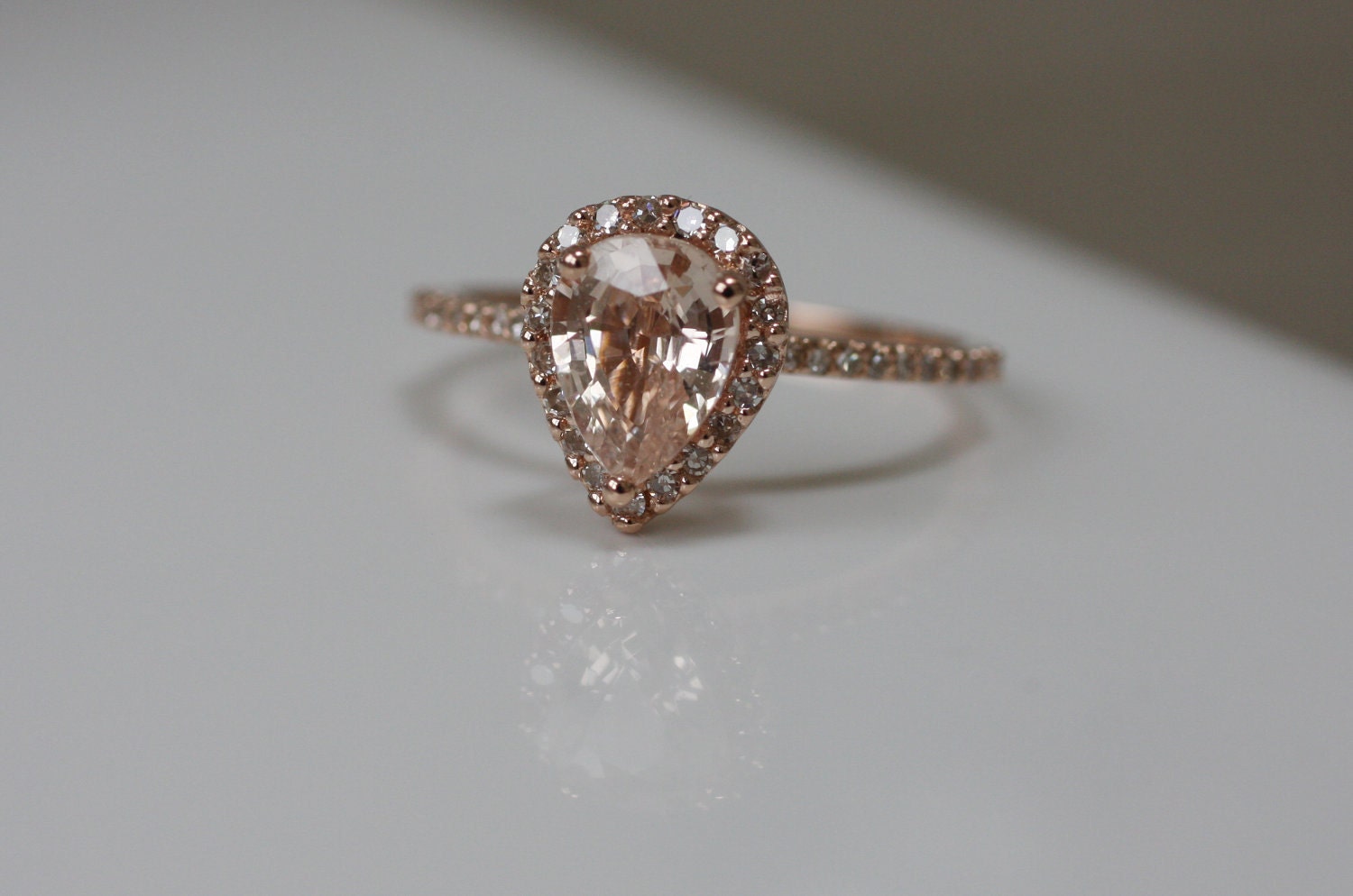 Peach champagne tear drop  sapphire and rose  gold  diamond ring 