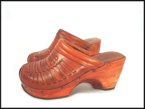leather clogs with wooden heels