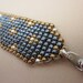 black and bronze wide square stitch cuff bracelet
