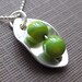 TWO PEAS IN A POD. Necklace - Sterling Silver and Green Mother of Pearls.