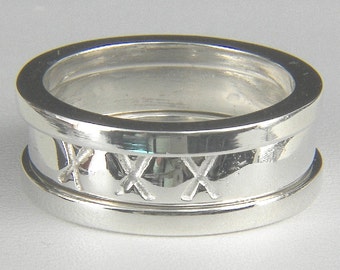 Anniversary ring with the soldered trim