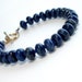 Lapis Bracelet: Goldfill, Silk, and Lapis Lazuli - ball end toggle, smooth 8mm rondelles, midnight blue, golden yellow, pyrite, 7.5 inch