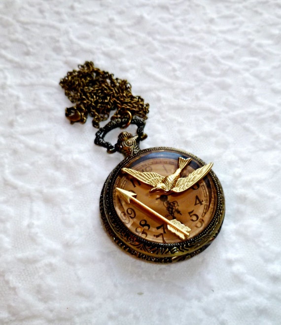 The GamemakerHunger Games Pocket Watch Necklace by Aeroglow
