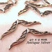 30 pcs of Wing Beads in Antique Silver plated pewter 40x9mm, double-sided wing beads MB 021