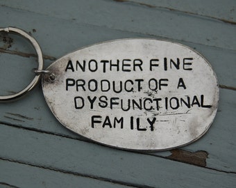 another fine product of a dysfunctional family key ring