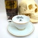 Gothic Strychnine Poison Tea cup and saucer Vintage altered plate handmade by Chase and Scout