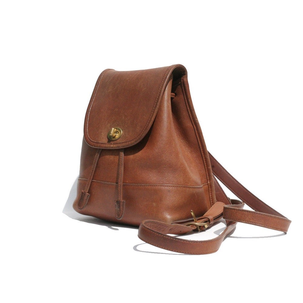 brown leather Coach backpack