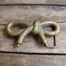 vintage c. 1970s brass BOW belt buckle