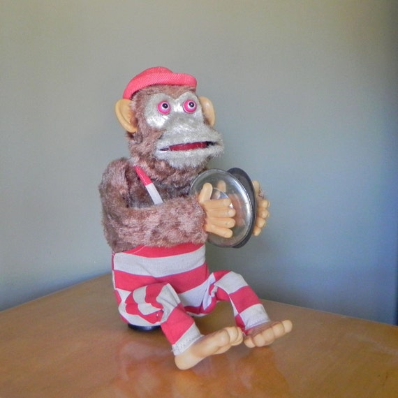 stuffed monkey with cymbals