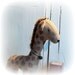 little giraffe on vintage Meccano wheels
