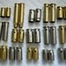 Bullet shell casing pendants, Lot of 28 Nickel silver and brass golden Bullet Shell Casings, Pre-drilled for your jewelry needs.....Lot 52