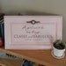 A girl must be two things... - Pink sign on reclaimed wood with vintage earring