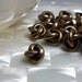 Love Knot bead Bronze 12mm 1pc
