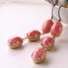 Earrings with vintage Coraline Peach art glass
